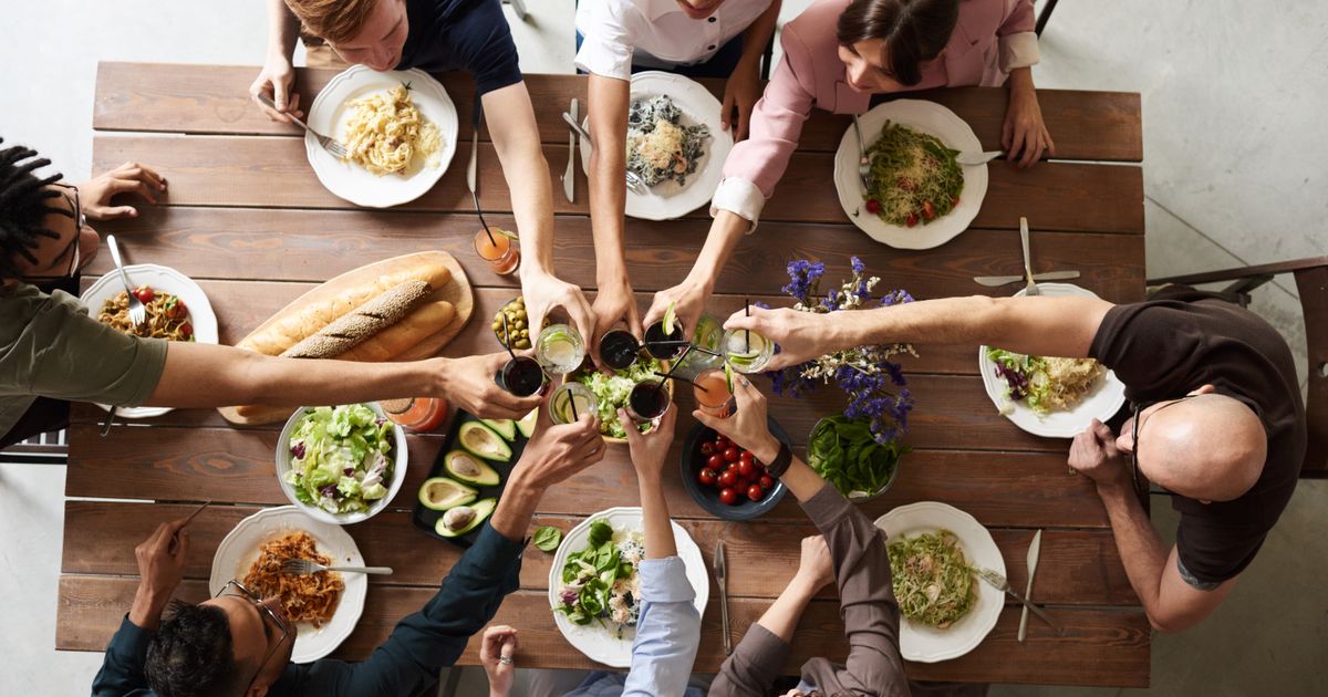Customer enjoying a meal at a restaurant table