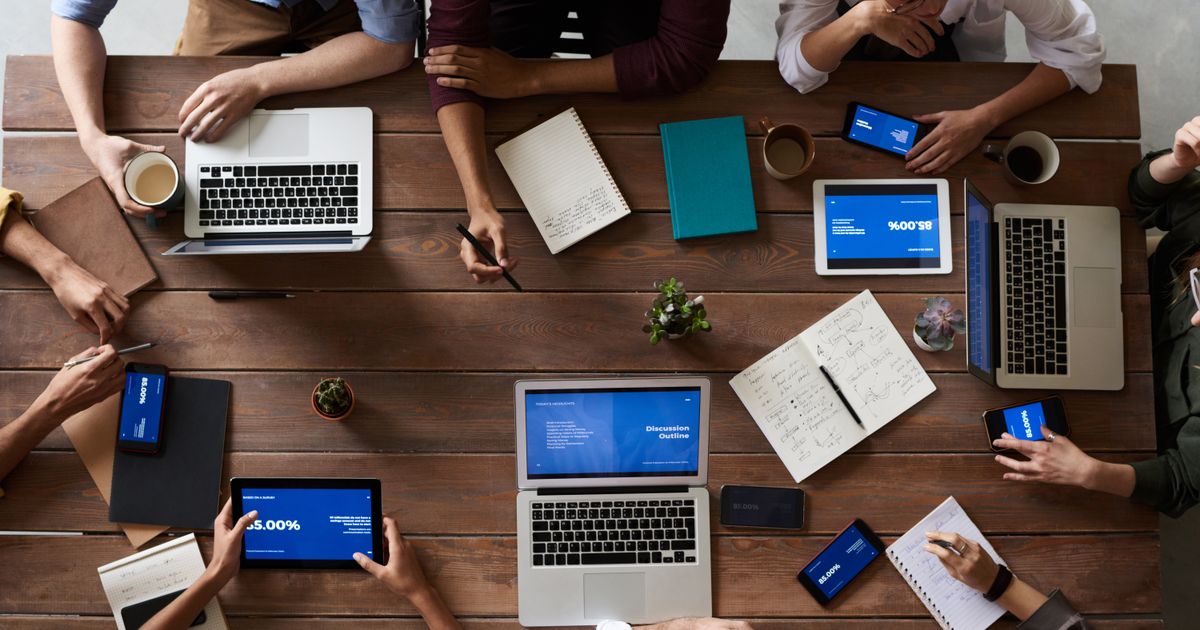 Professional team collaborating on content strategy in modern workspace