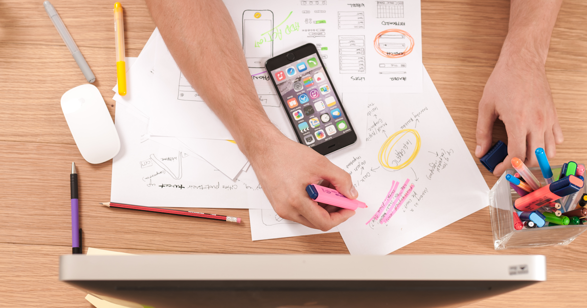 Marketer crafting cold email outreach campaigns at a focused workspace