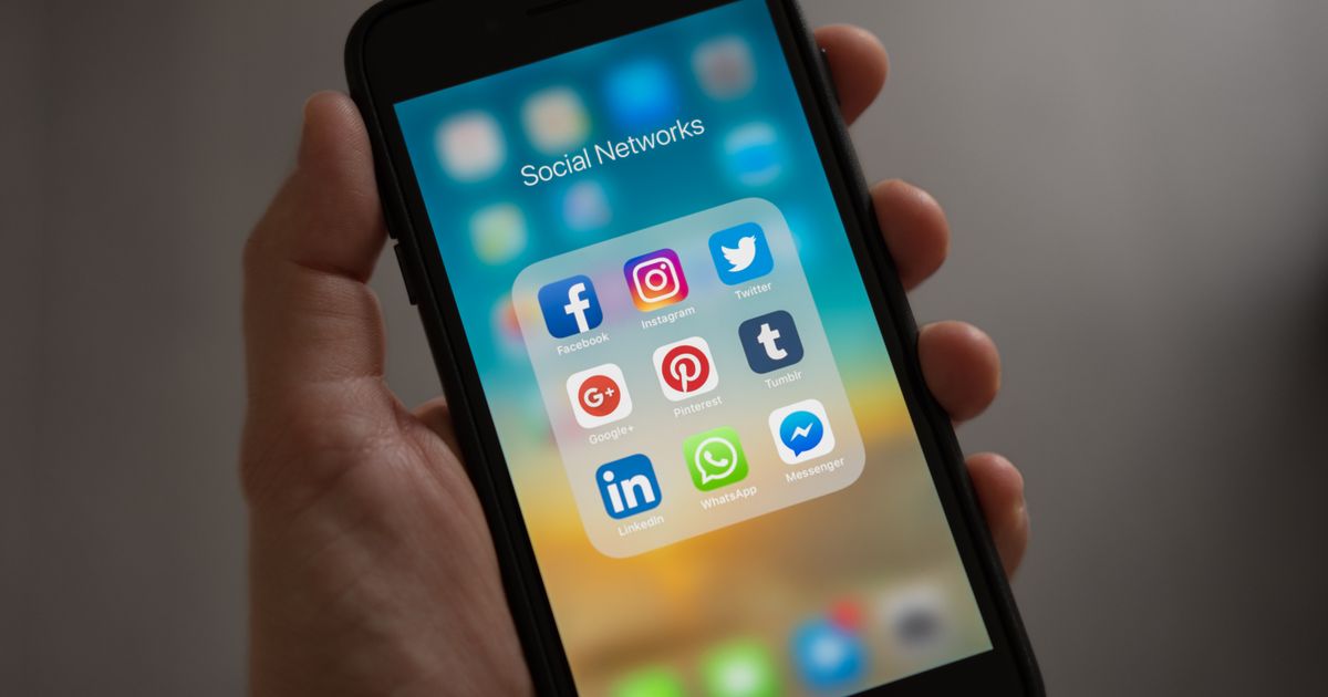 Smartphone showing social media apps and notifications